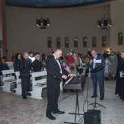 Połączone Chóry wykonują wspólnie kolędę na zakończenie koncertu.